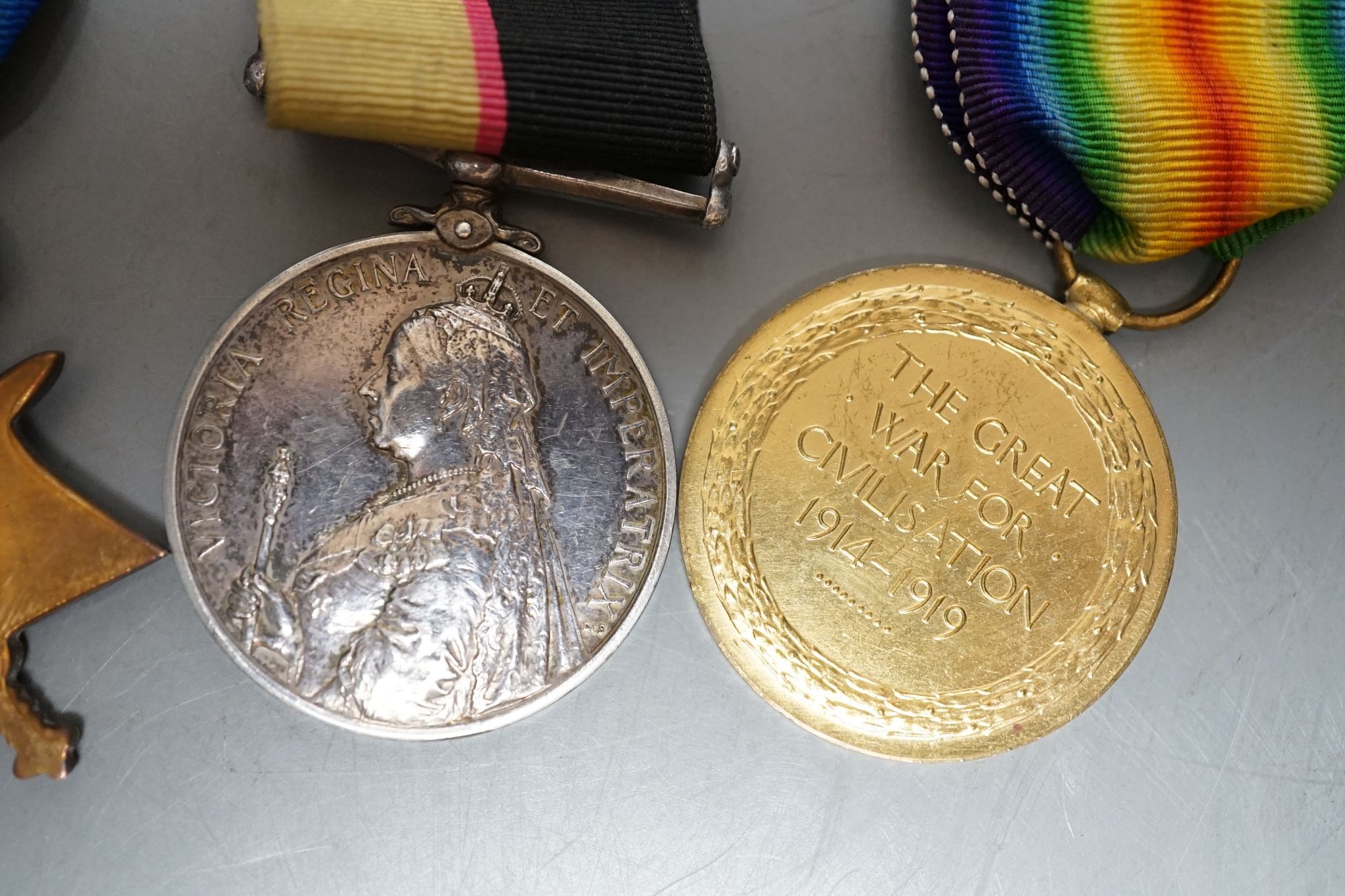 A medal trio awarded to Pte J Black, to include a Queen's Sudan, 1899
